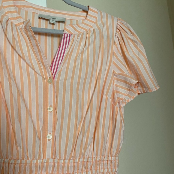 A dress with stripes. I am 5’2 and it is a midi dress on me. - Picture 2 of 4